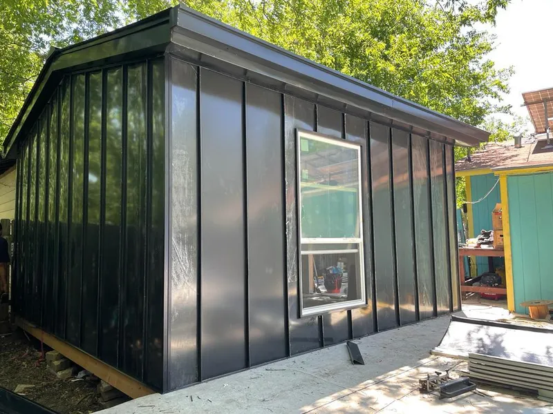 Black standing seam metal wall panels for Metal Roof Installation in South Kingstown