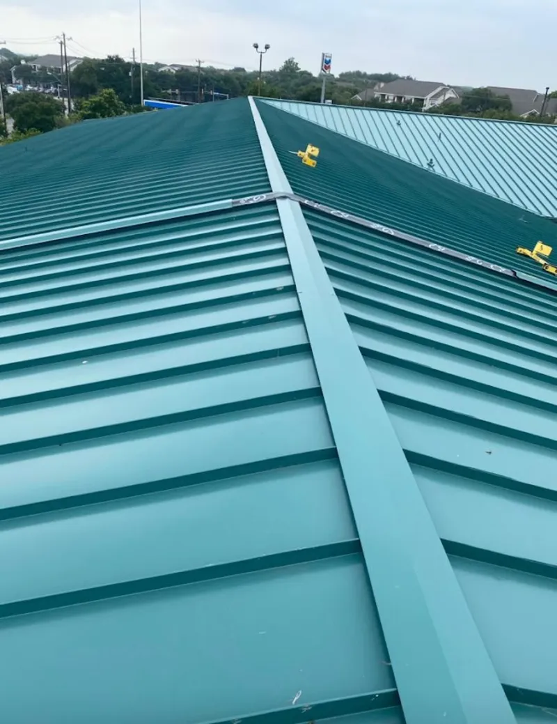 Green commercial metal roof ridge and valley for Metal Roof Repair in South Kingstown