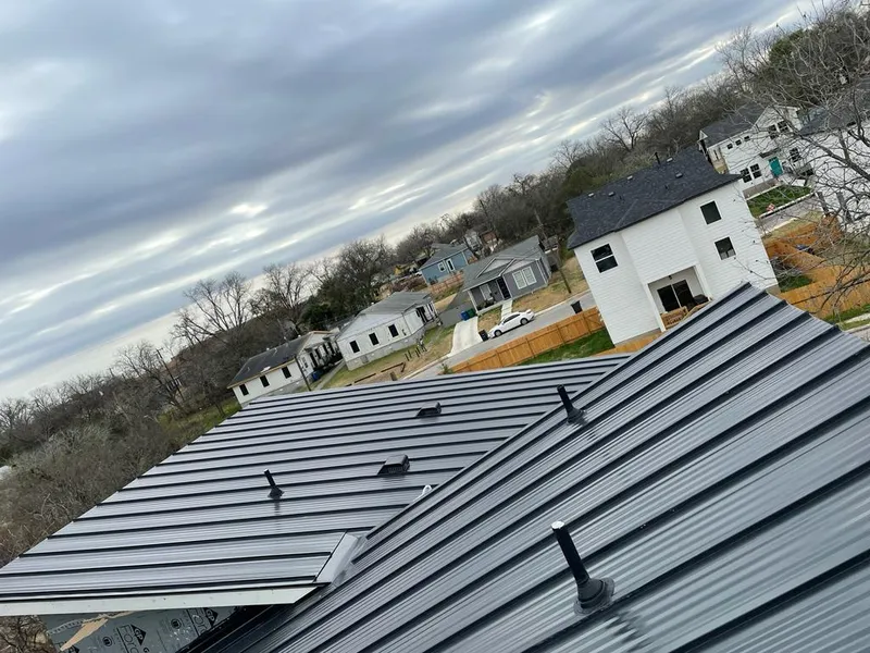 Standing seam metal roof panels with vents for Skylight Repair in South Kingstown
